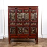 Lacquer and giltwood cabinet Chinese, with carved symbols on the doors, fitted drawers and further