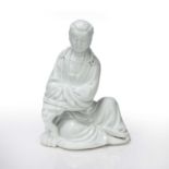 Blanc de chine model of a seated figure of Guanyin Chinese, modelled in the 18th Century style, 20cm