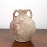 Two handled earthenware flask 17th/18th Century, of Roman form, 23cm Weathered due to the age and