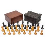 Staunton ebony and weighted boxwood chess set in a mahogany box, king 10cm high, box 21cm wide and a