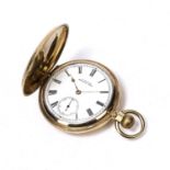 Gold plated hunter pocket watch by A W Waltham, with enamel dial, seconds dial and winding