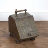Aesthetic brass coal scuttle in the manner of Bruce Talbert, with embossed designs, 27cm wide x 40cm