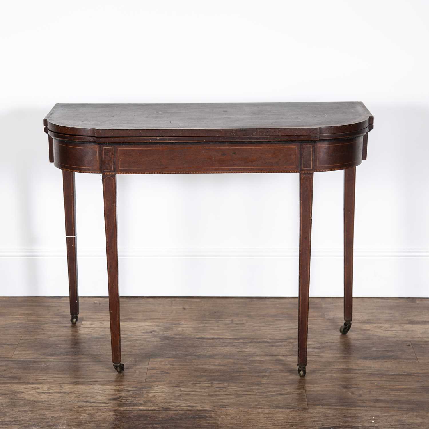 Mahogany tea table 19th Century, with satinwood crossbanded fold over top, on tapering legs, 94cm