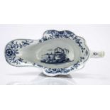 Worcester sauce boat porcelain, circa 1755-57, painted with the 'Wavy line Fisherman' pattern and '