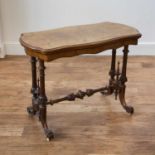Burr walnut card table Victorian, with red baize inside the folding top, standing on swept legs
