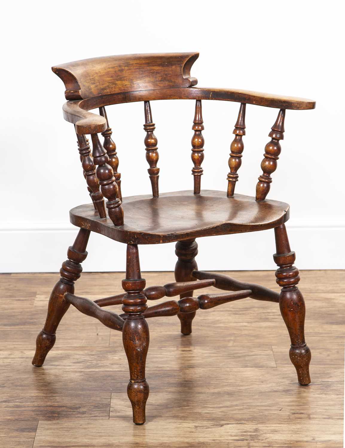 Ash and elm smokers bow armchair 19th Century, turned spindle supports, on turned legs, 81cm high