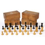 Four Staunton boxwood chess sets each in a sliding case, king 9cm highOverall wear and marks. Some