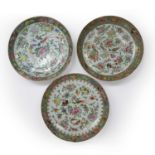 Three Cantonese famille rose shallow porcelain dishes Chinese, 19th Century, each with painted birds