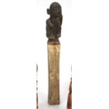 Group of carved bone tribal pieces including dagger handles and other carved items (9)At present,