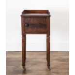 Mahogany pot cupboard or bedside table 19th Century, with galleried top, on turned legs