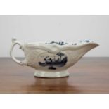 Worcester sauce boat porcelain, circa 1755, painted with the 'Moored Boat' pattern, 8cm across