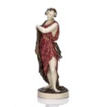 Royal Worcester classical figure circa 1900, modelled by James Hadley, the figure holding a long