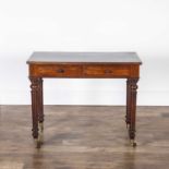 Mahogany side table in the manner of Gillows fitted with two frieze drawers on fluted legs,