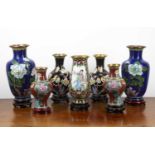 Group of cloisonne vases comprising of a pair of black ground vases decorated with birds and