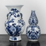 Two blue and white porcelain vases Chinese, 19th Century including a flared vase painted with