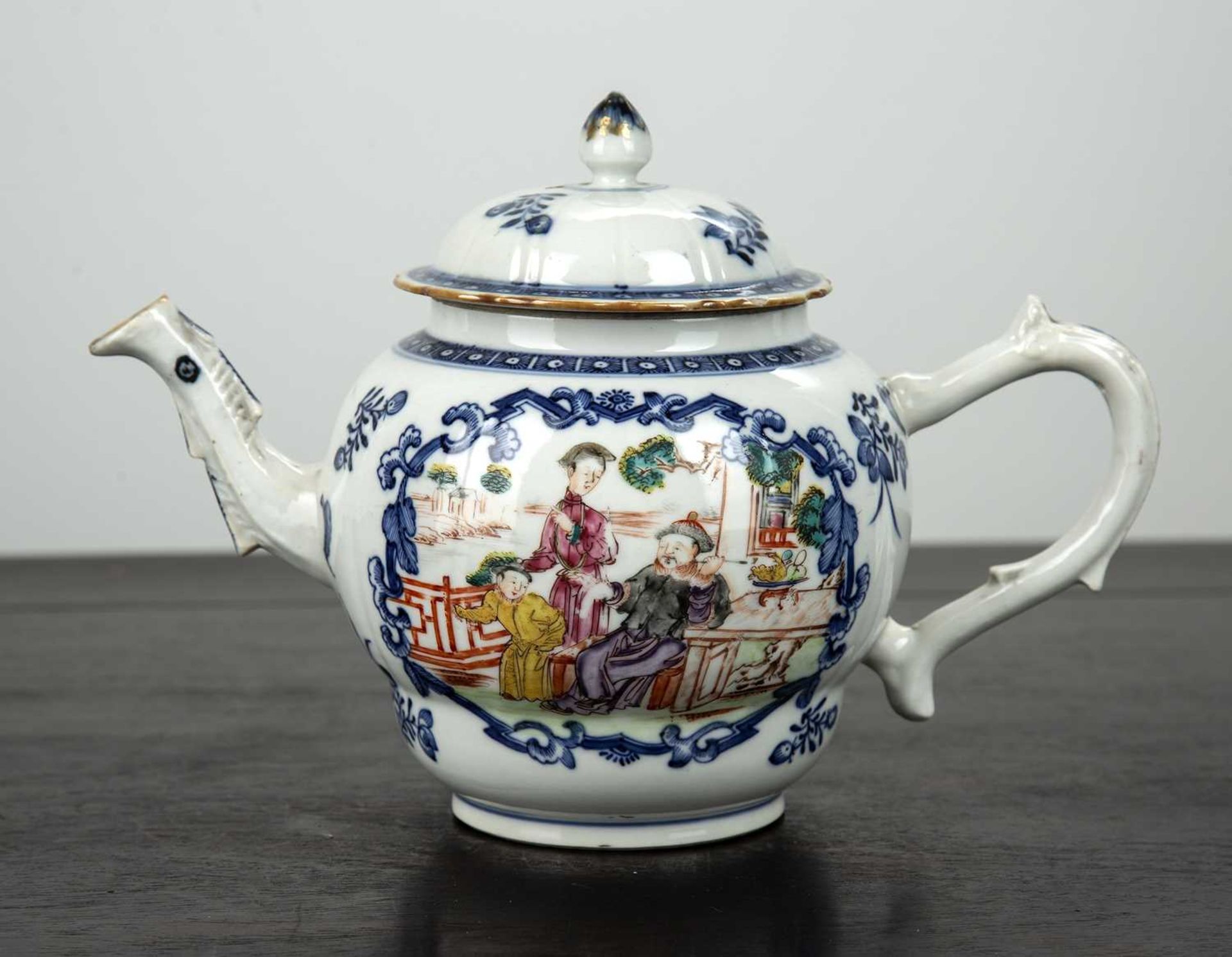 Mandarin porcelain teapot Chinese, 18th Century painted with blue framed panels of figures, 22.5cm x