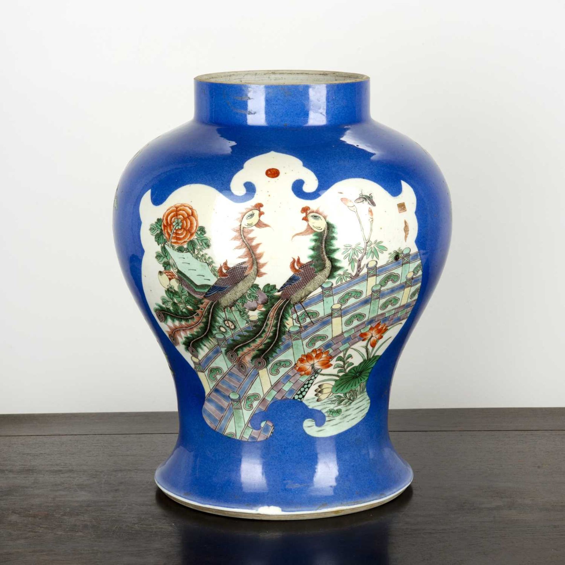 Powder blue ground baluster vase Chinese, 19th Century having two painted reserve panels with
