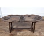 Lotus carved wood occasional table Burmese with shaped top and lotus flower decoration, 125cm