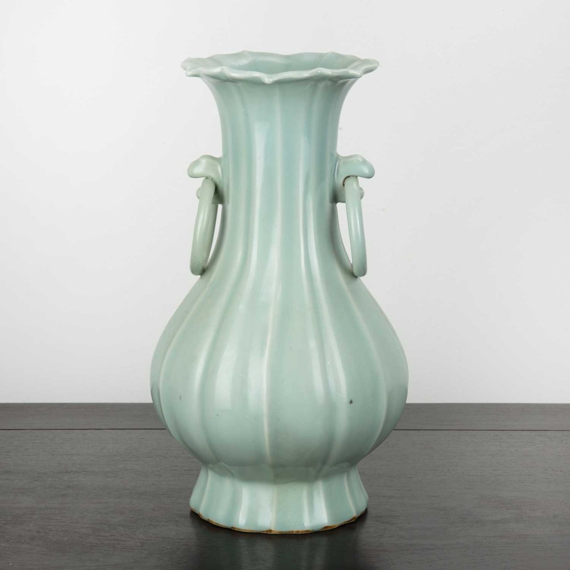 Celadon riveted vase Chinese covered with a pale celadon glaze, flanked by two set handles with - Image 3 of 5