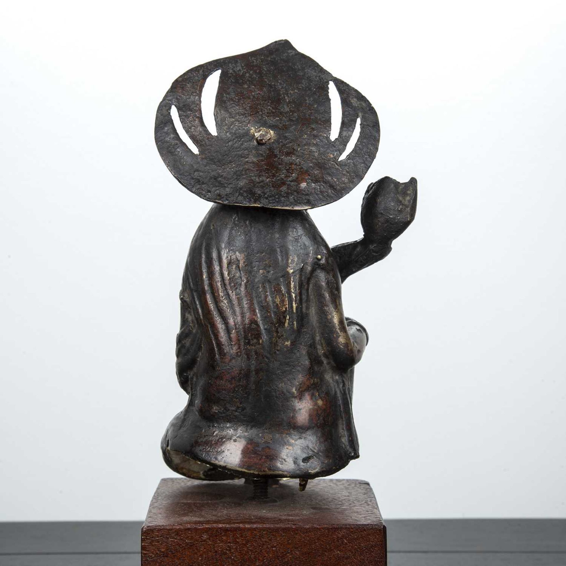 Part gilded bronze Bodhisattva South East Asian, 17th Century the kneeling figure holding a lotus - Image 2 of 3