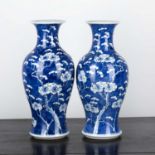 Pair of blue and white baluster vases Chinese, 19th Century each painted with prunus blossom, and