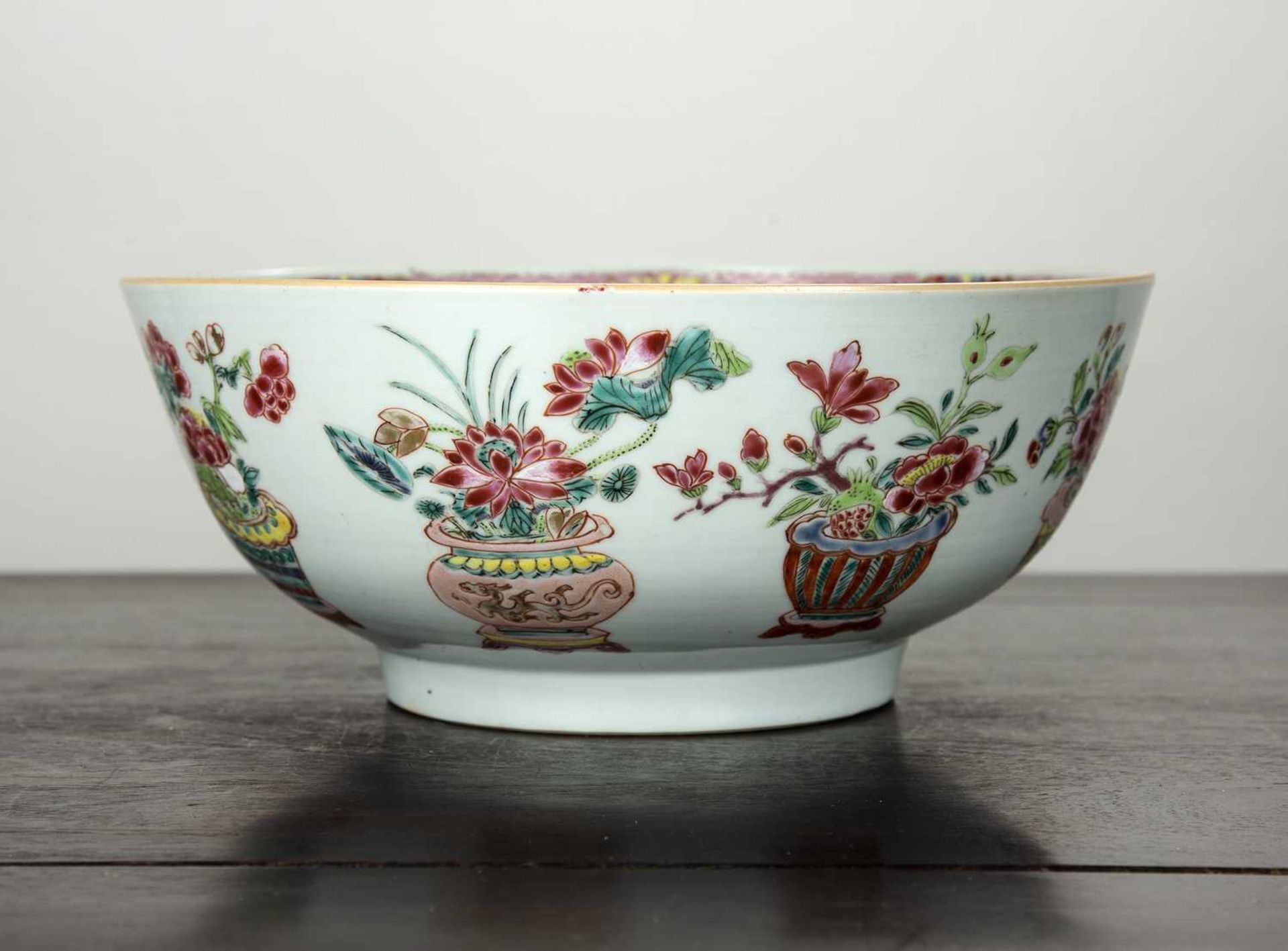 Famille rose bowl Chinese, 18th Century painted in enamels with baskets of flowers around the edge