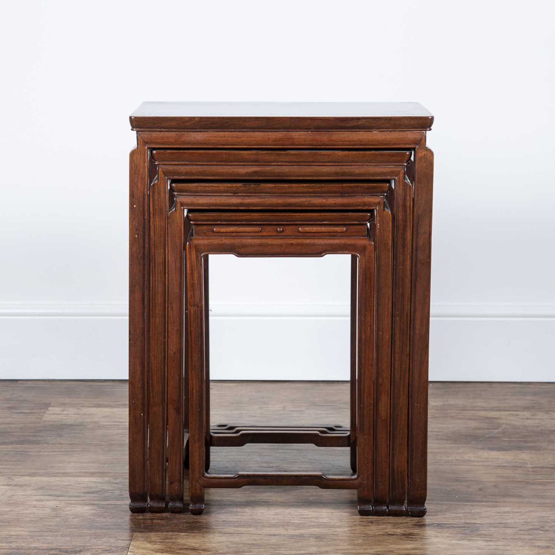 Nest of four hardwood tables Chinese, circa 1900 each with a rectangular top and on shaped