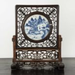 Circular blue and white porcelain and hardwood table screen Chinese, 19th Century the panel is