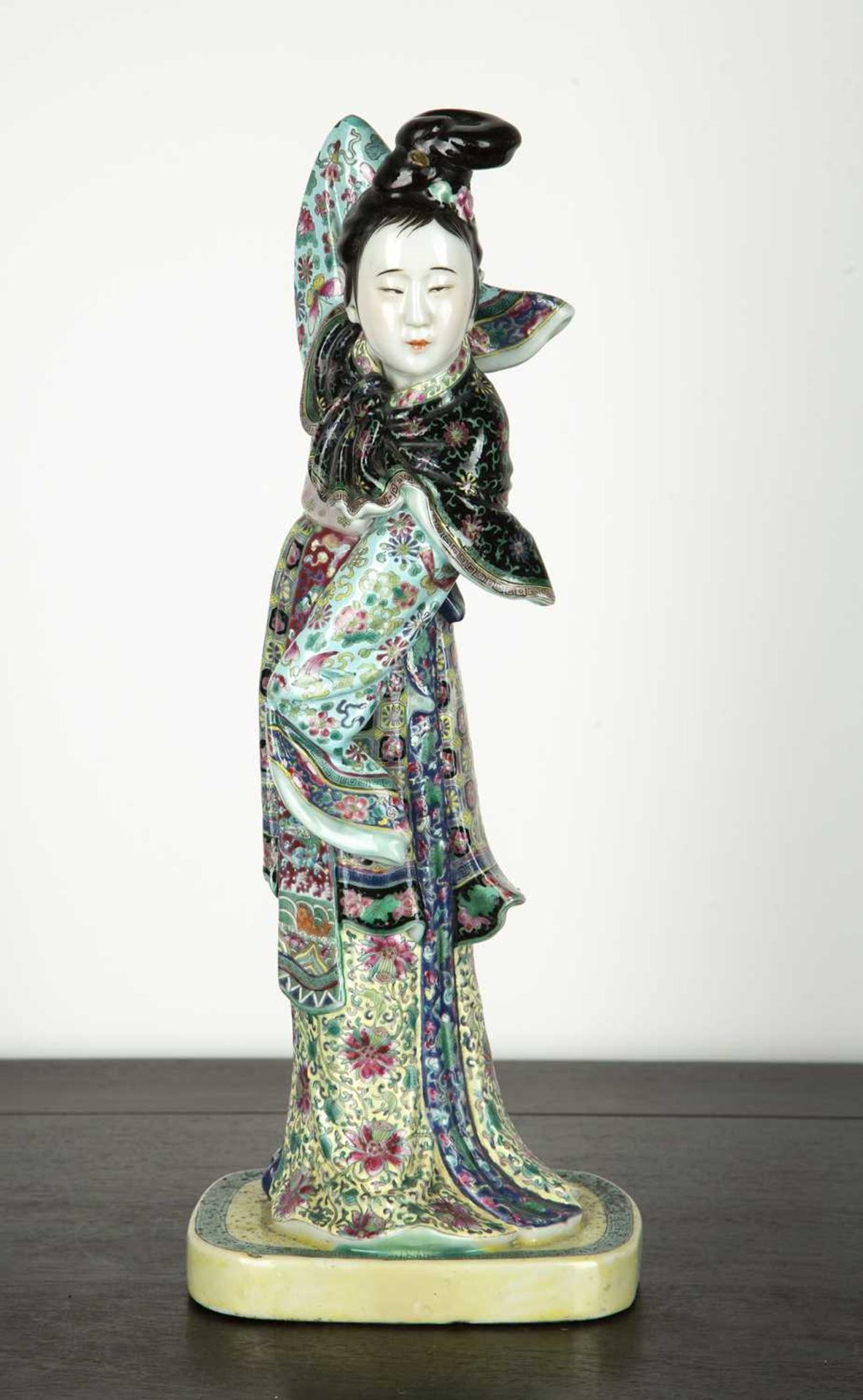 Porcelain model Chinese, Republic period decorated in famille verte colours, dressed in formal
