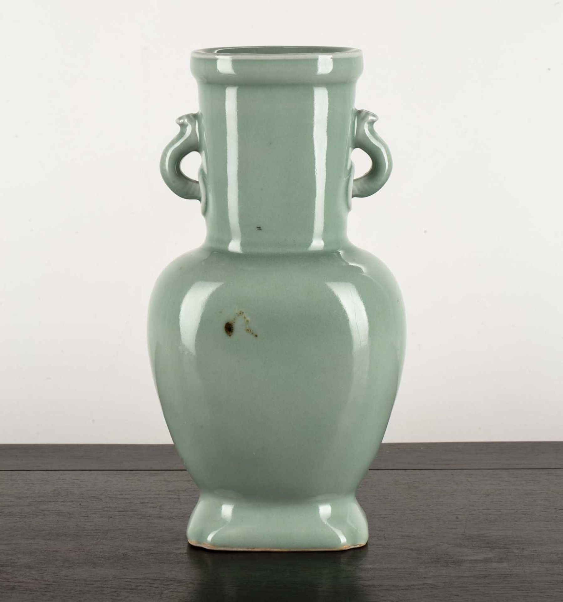 Celadon vase Chinese decorated all over with a pale green glaze, with two loop handles and - Image 2 of 3