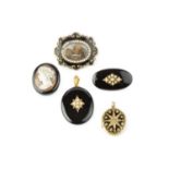 A collection of 19th century jewellery, comprising a half pearl and onyx oval memorial locket