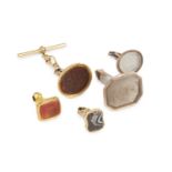 A collection of antique and later hardstone seal fobs, comprising a chalcedony mounted seal fob,