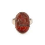 A carnelian intaglio ring, the possibly Sasanian intaglio depicting a figure on horseback, to a