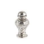 Omar Ramsden (1873-1939) An Arts and Crafts pepper pot silver with spot-hammered decoration,