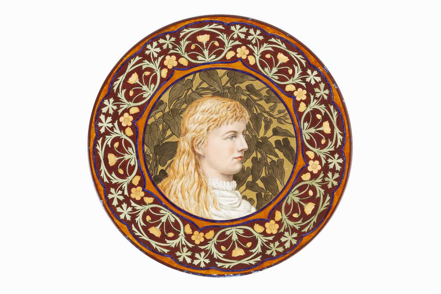 Aesthetic Movement Art pottery charger manufactured by Derby painted with a Pre-Raphaelite maiden in