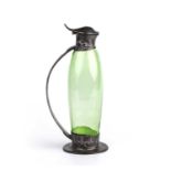 Archibald Knox (1864-1933) for Liberty & Co. Claret jug pewter with fitted green glass impressed