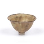 Mary Rogers (b.1929) Footed bowl porcelain with an ochre glaze and dark rim incised initials 6.5cm