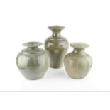 John Lomas (Contemporary) Three lamp bases celadon glazes and incised decoration largest 42cm