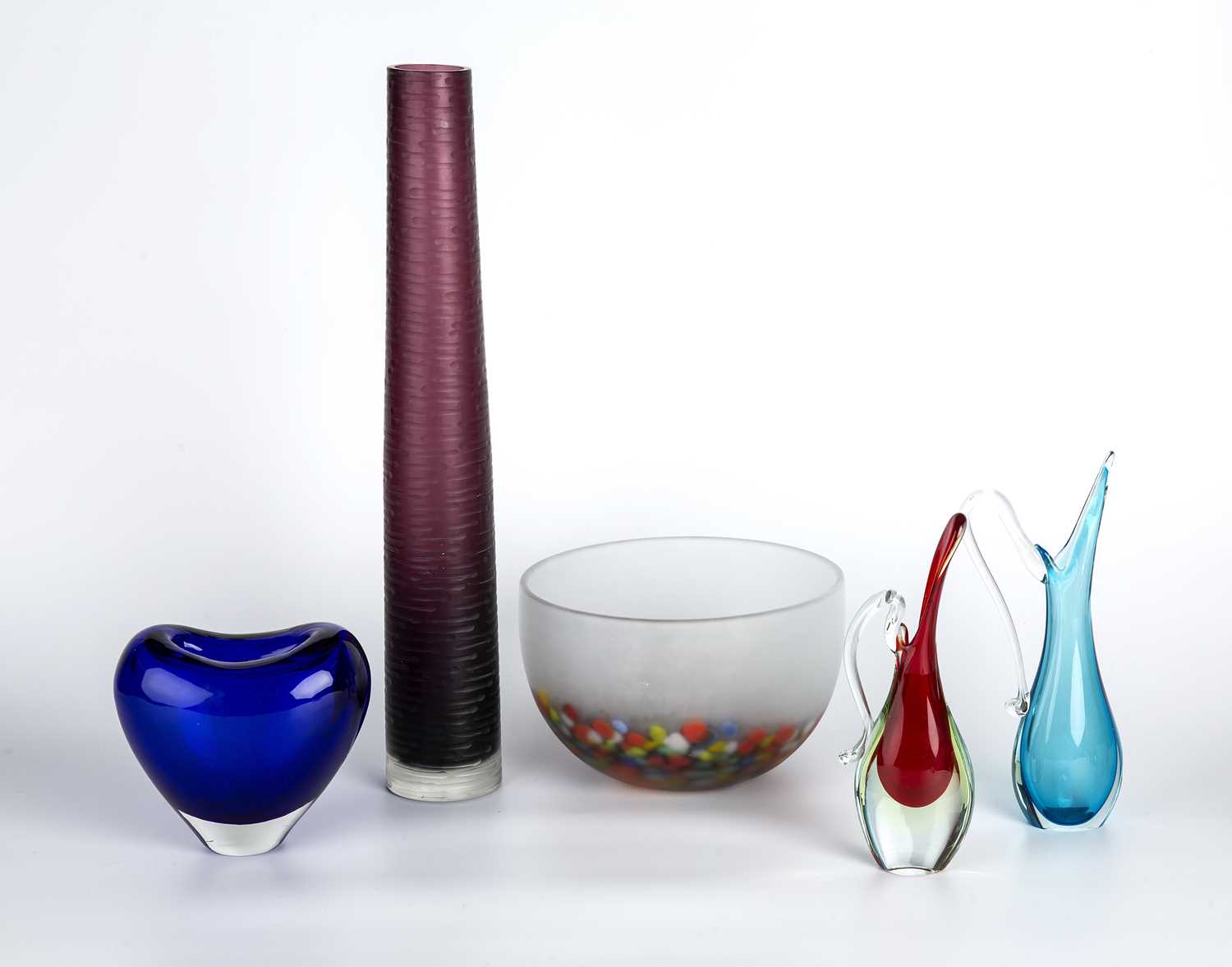 Murano Five pieces of glass including a heart-shaped blue glass vase 15cm high; two sommerso jugs,