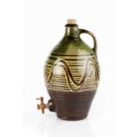 Michael Cardew (1901-1983) at Winchcombe Pottery Cider flagon with wave decoration on a green and