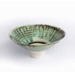 Peter Wills (b.1955) Footed bowl porcelain, with green glaze with a flowing brown rim, wood ash