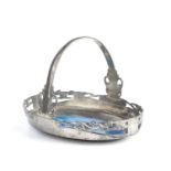 Archibald Knox (1864-1933) for Liberty & Co. Cake basket, circa 1900-05 pewter with enamel impressed