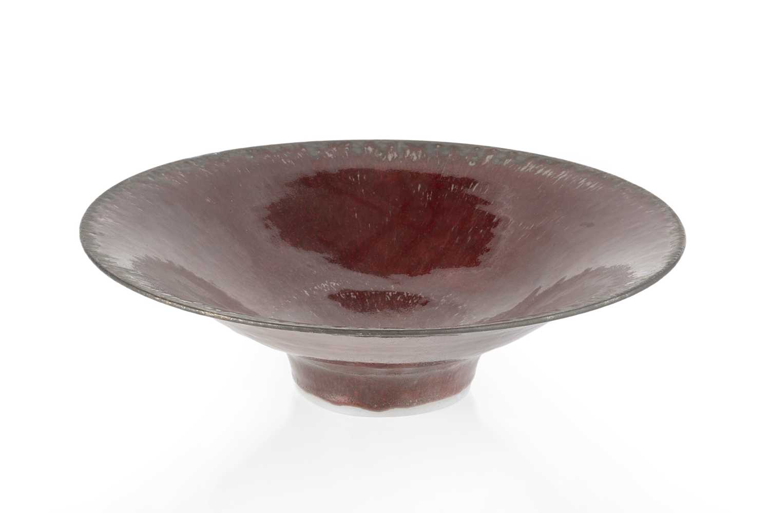 Abdo Nagi (1941-2001) Flared bowl red glaze with bronze rim impressed potter's seal 10.5cm high,
