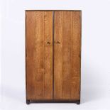 Heals Wardrobe, circa 1920 oak, adaptable four shelves and hanging space, doors finished with