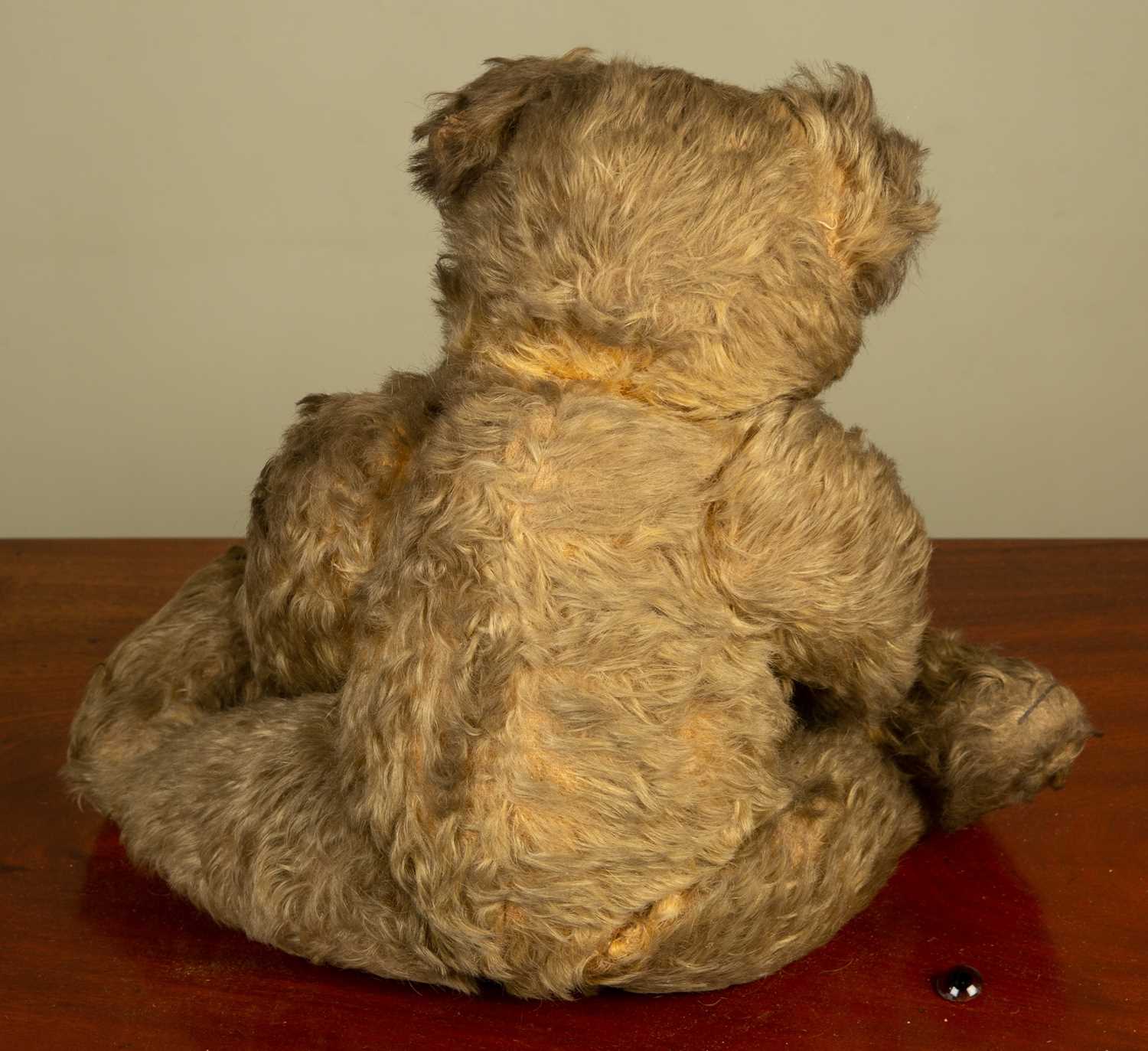 An early 20th century Farnel teddy bear with a 'Farnel's Alpha Toys' label to the foot, 46cm in - Image 2 of 3