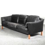 A 1970's Danish black leather upholstered sofa