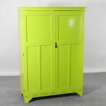 An early 20th century painted wardrobe