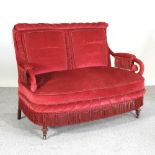 A Victorian upholstered sofa