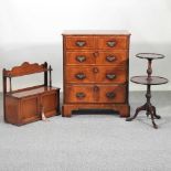 A reproduction walnut cabinet