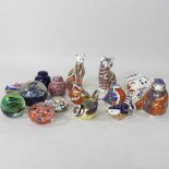 A collection of Crown Derby paper weights